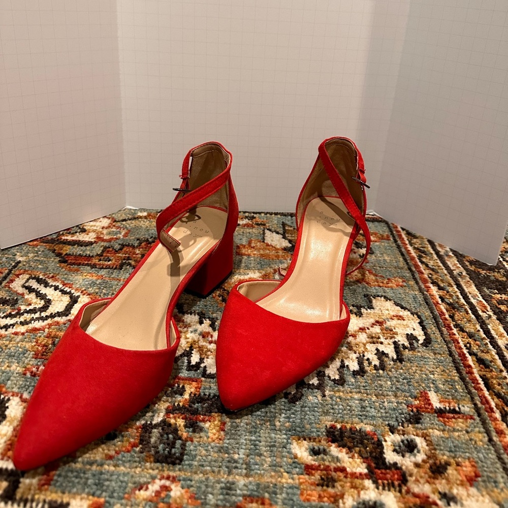 A New Day red heels in size 7.5
